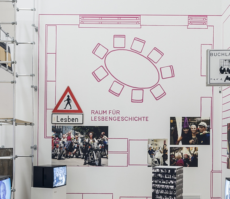 Exhibition view with pink floor plan of the Lesbian Archive, Archiv Galerie, Haus der Kunst, 2021, Photo Maximilian Geuter.