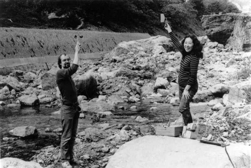Fujiko Nakaya and Bill Viola measure wind direction and speed in the Ojika River valley, Japan, 1980. Photo: Kira Perov