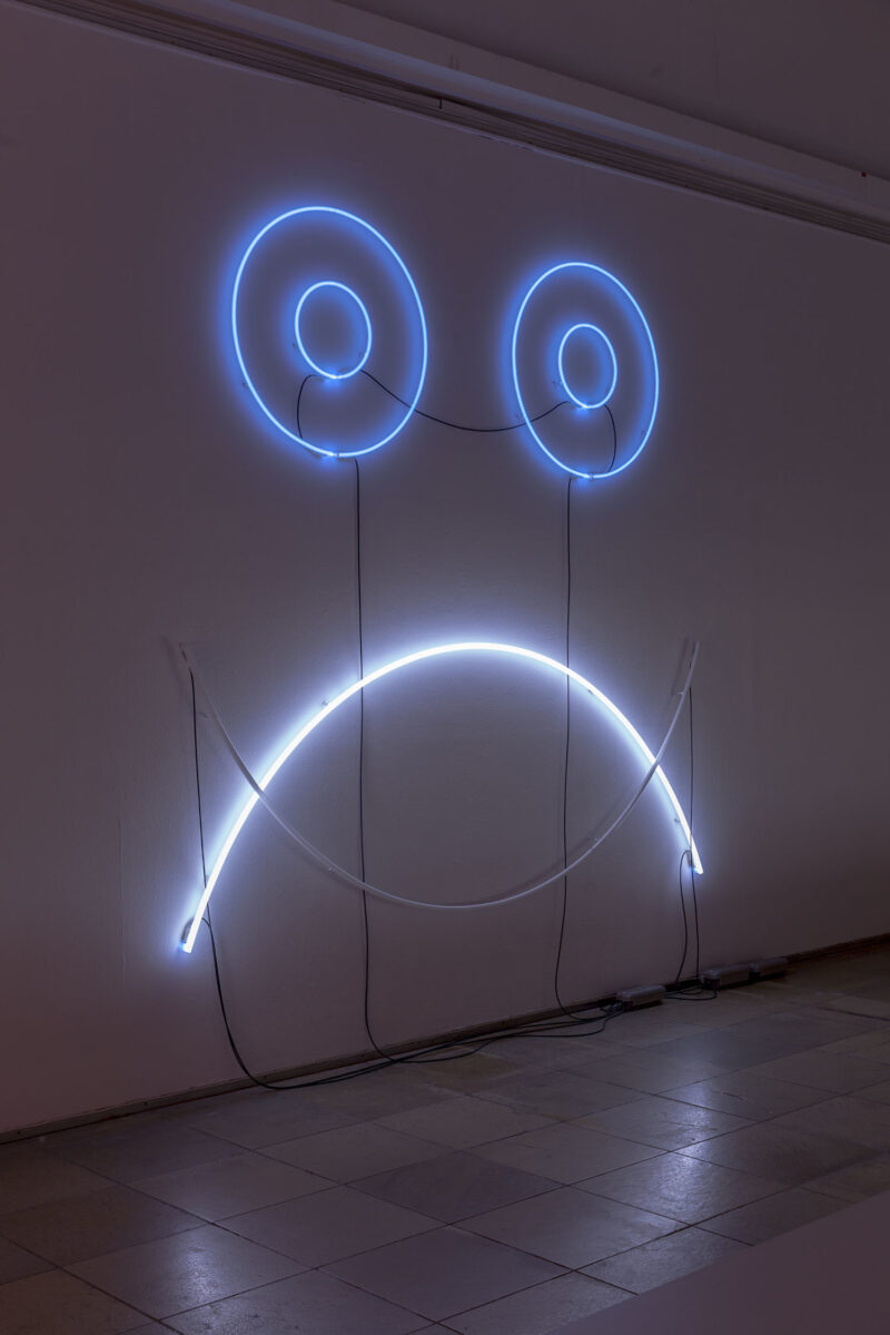 Adele Röder Installation view Haus der Kunst COMCORRÖDER Mask Totem (Part Four) C-Component and Umlaut Neon Lights (Neon / Argon / Krypton / Mercury), 2010/2015 From "O L Y M P I A, or: Message from the Dark Room" Series. Photo: Maximilian Geuter